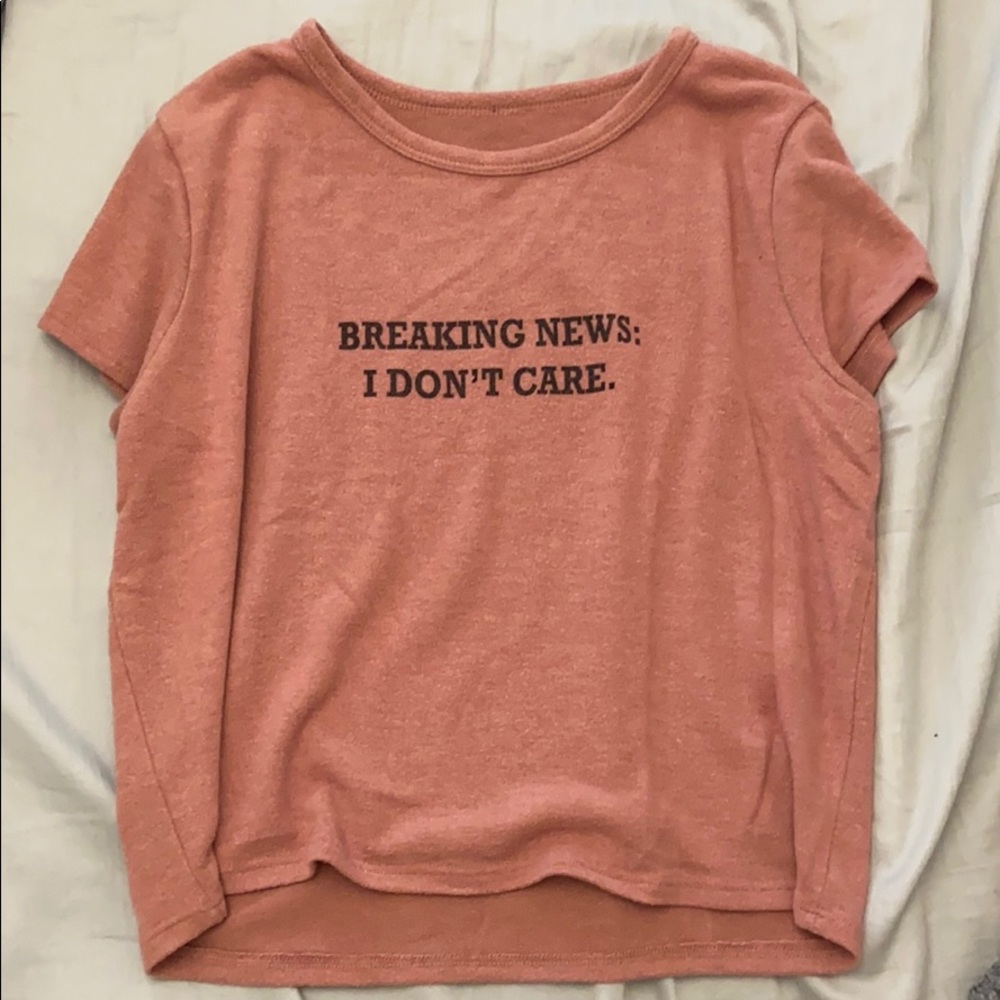 “Breaking News: I don’t care” top🖤